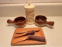 Full set showing board, bowls, toothpick holder, spreaders