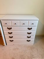 Left tower showing drawer configuration and hardware