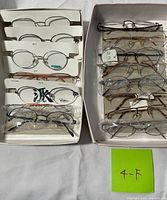All 11 eyeglass frames in two trays