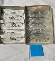 Full box showing both styles of eyeglass frames