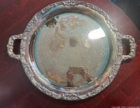 Top view showing full tray, ornate rim and handles