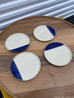 Top view of all four plates showing color and condition