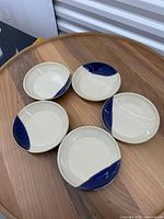Top view of all five Neva stoneware plates