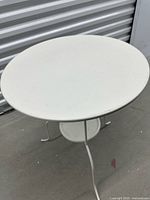 Top view of white metal round side table