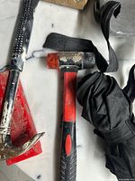 Close-up of claw hammer, dead blow hammer and taping knife