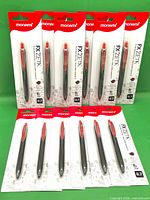 Twelve blister-packed Monami FX Zeta pens displayed front-on