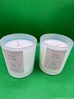 Two identical Rose Glow candles side by side