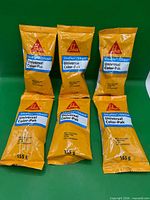 Front view of six Sika Universal Color-Pak sachets