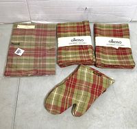 Full set showing apron pack, two packs of tea towels, single oven mitt
