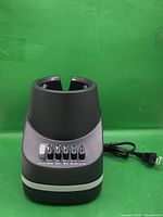 Front view of Mainstays blender base showing control buttons and cord