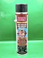 Full view of Doktor Doom aerosol can with cap and spray straw