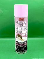 Full view of the aerosol can showing brand, product name and cap