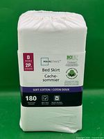 Front of packaged Mainstays bed skirt showing size, brand, material, 180 thread count