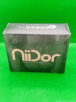 Front of Niidor box with branding visible