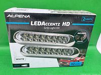 Front of box showing Alpena LEDAccentz HD Grill Light Kit, two lights, 32 LEDs