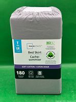 Front of packaged Mainstays twin bed skirt showing brand, size, 180 thread count