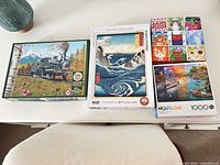 All four puzzle boxes on tabletop