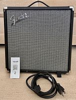 Front view of Fender Rumble 25 amplifier with power cable