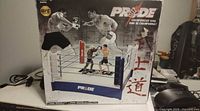 Front of original box displaying Pride Championship Ring playset image and branding