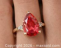 Ring on finger showing overall design and size