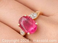 Ring worn on finger showing scale and design