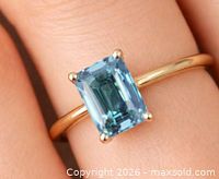 Ring on finger showing overall design