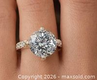 Ring on finger showing overall appearance and diamond size