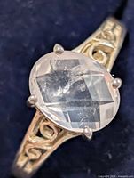 Top view of silver ring with oval rose quartz