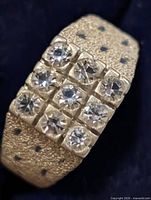 Top view of ring showing 9 clear stones in 3x3 grid and textured band