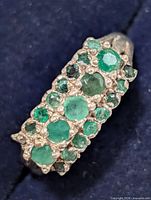 top view showing two rows of emeralds