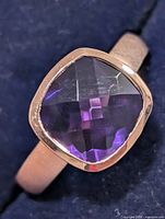 Top view of ring showing cushion-cut amethyst