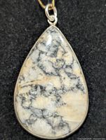 Front view pendant showing dendritic opal pattern