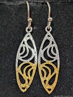 front view of both earrings showing full filigree and two-tone detail