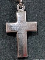front view of cross pendant