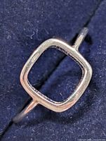 angled top view of ring highlighting thin band