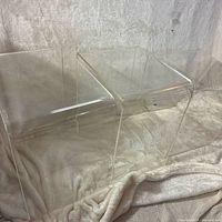 All three clear acrylic nesting tables arranged together