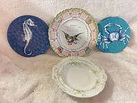 Group shot of all four ceramic pieces front view