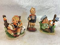 Front view of all three figurines together