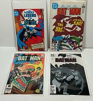 Front covers of all four bagged and boarded Batman comics
