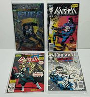 All four bagged Punisher comics displayed