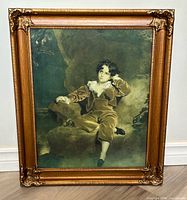 Full view of framed print standing upright