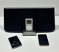 Front view of Sony dock with three iPods displayed