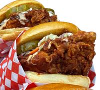 Close-up fried chicken sandwiches representing restaurant offerings