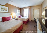 Sample Monte Carlo Inns guest room with two queen beds