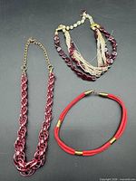 All three necklaces arranged together