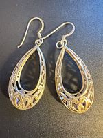 Full view of both teardrop filigree earrings