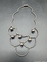 Full view of sterling silver layered rope necklace