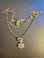 Full view of sterling silver necklace and pendant