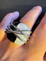 Top view showing two-tone cabochon and criss-cross silver wrap