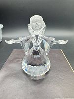 Full view of Swarovski crystal angel figurine showing body, wings, and arms